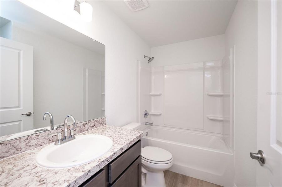 Furnished interior view inside a new home in , Frostproof (Image 5).