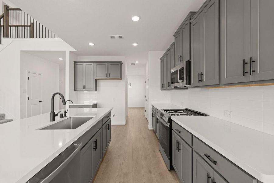 This kitchen is not only a functional space but also has ample storage. Whether you're a seasoned chef or just love to gather and enjoy good food, this kitchen is a dream come true. This kitchen is not only a functional space but also has ample storage. Whether you're a seasoned chef or just love to gather and enjoy good food, this kitchen is a dream come true.