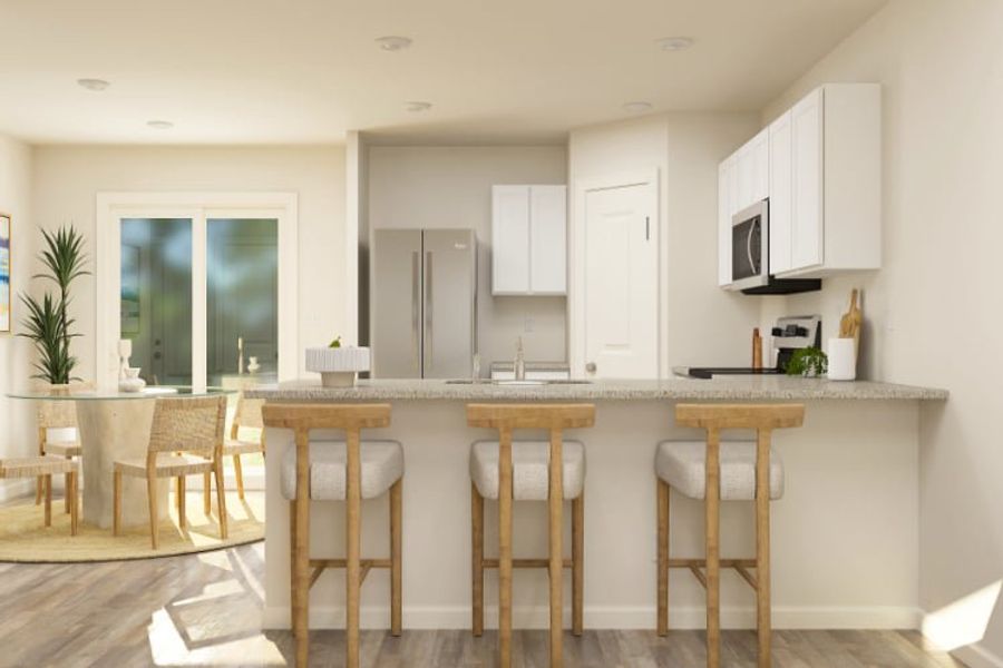 A kitchen with white cabinets. A kitchen with white cabinets.