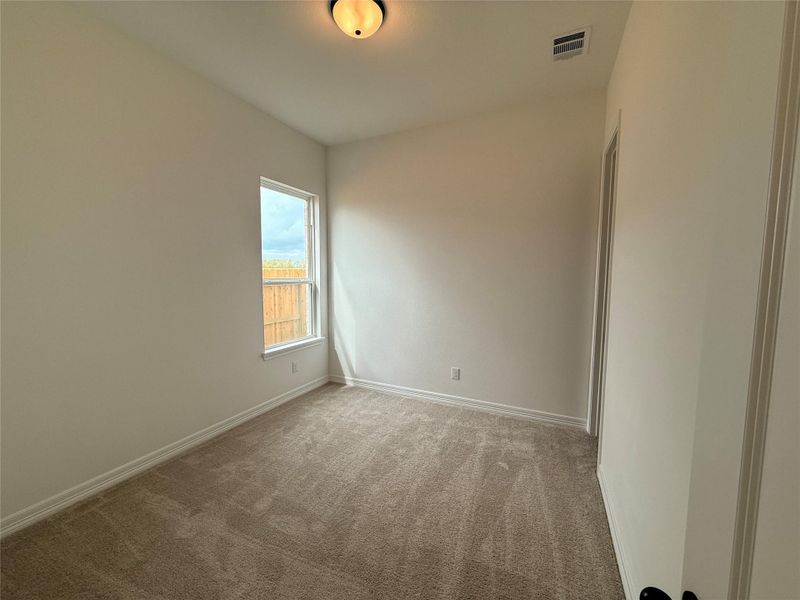 Spacious, unfurnished interior of a new home in Wildrye, Waller (Image 29).