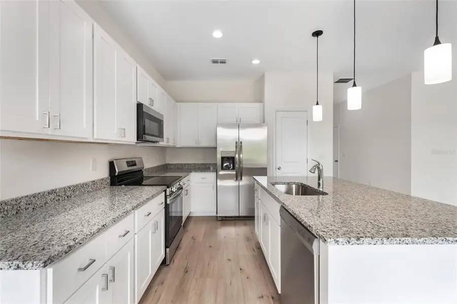 Furnished interior in a model home at Grand Isle in Eustis (Image 7). Furnished interior in a model home at Grand Isle in Eustis (Image 7).