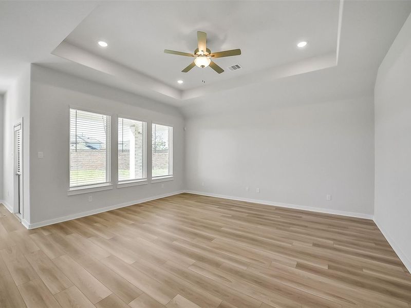 Spacious, unfurnished interior of a new home in Sunterra, Katy (Image 26).