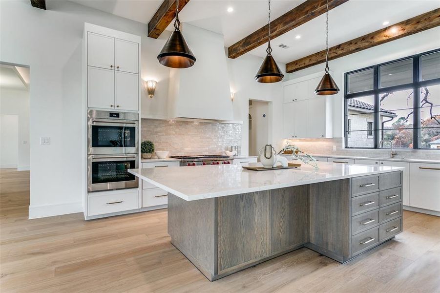 Chef's kitchen with large center island with room for 4 bar stools. The perfect place for family gatherings. Chef's kitchen with large center island with room for 4 bar stools. The perfect place for family gatherings.