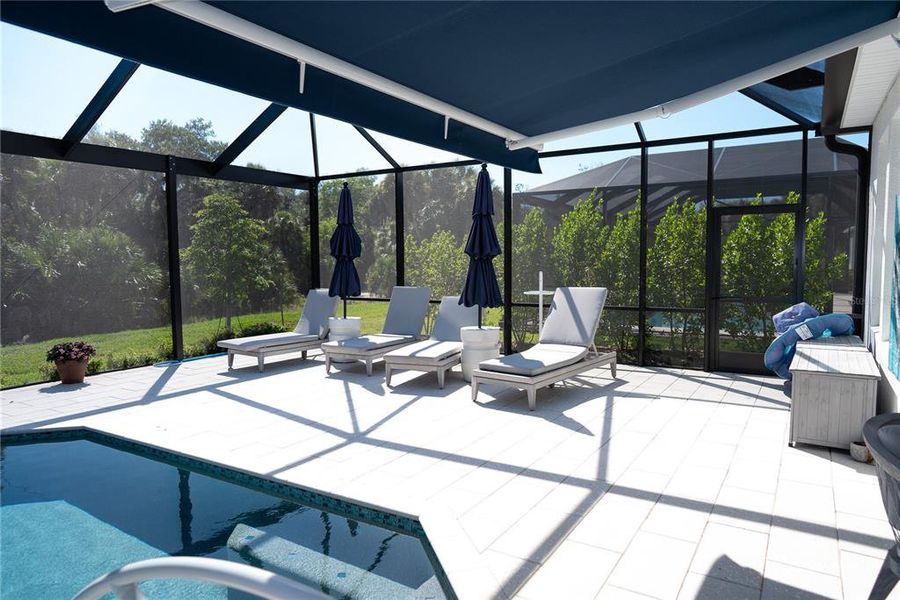 Exterior details and patio area of a home in , Sarasota (Image 3).