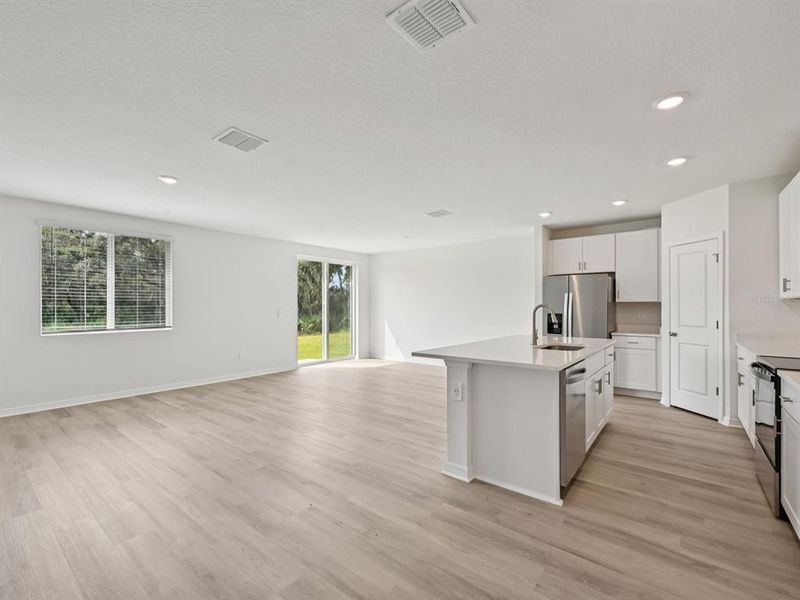 Spacious, unfurnished interior of a new home in The Reserve at Van Oaks, Auburndale (Image 10).