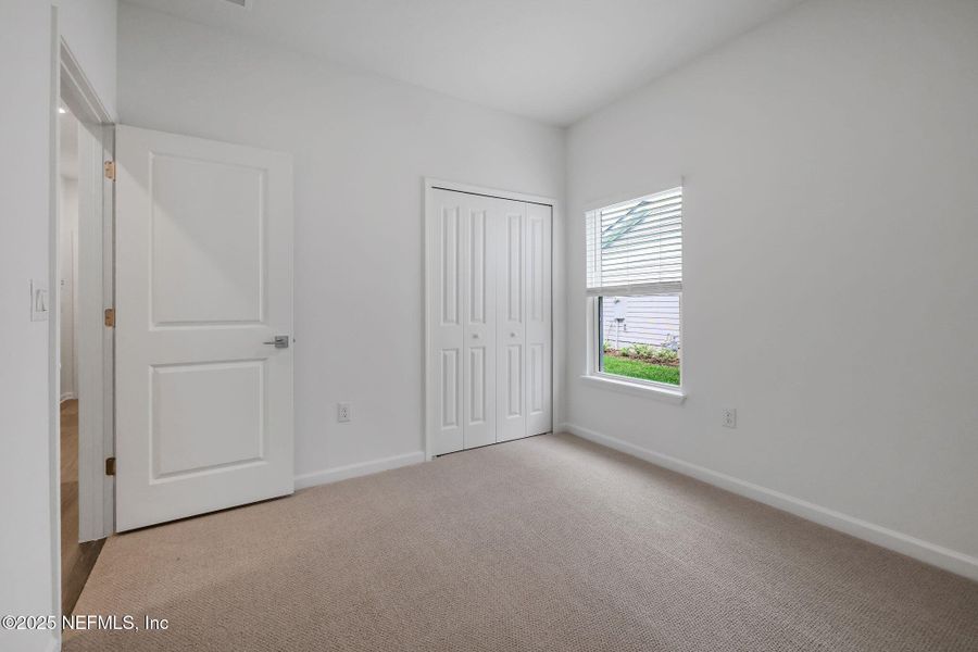 Spacious, unfurnished interior of a new home in Brook Forest, St. Augustine (Image 18).