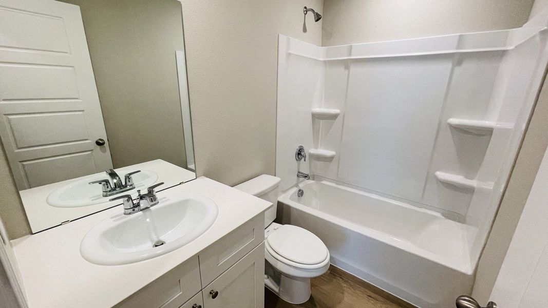 Furnished interior view inside a new home in Sunnycreek, Crowley (Image 6).