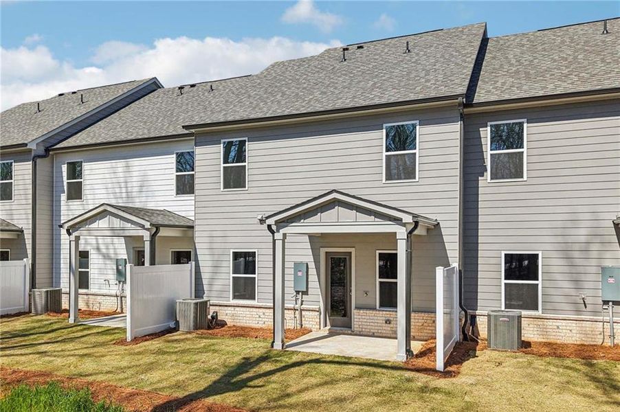 Exterior details and patio area of a home in Eastlyn Crossing, Flowery Branch (Image 17). Exterior details and patio area of a home in Eastlyn Crossing, Flowery Branch (Image 17).