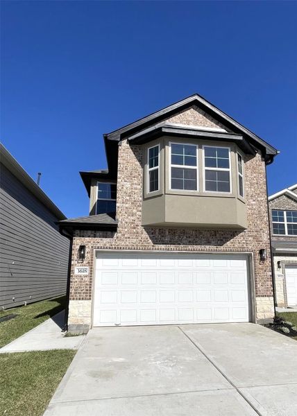 Front exterior of a new home in , Missouri City, TX, highlighting curb appeal (Image 26). Front exterior of a new home in , Missouri City, TX, highlighting curb appeal (Image 26).