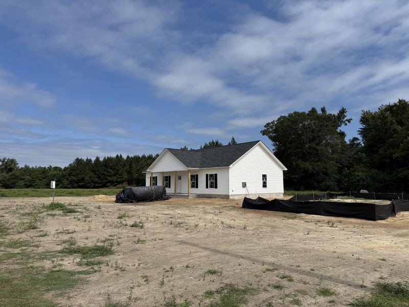 Front exterior of a new home in , St. George, SC, highlighting curb appeal (Image 14). Front exterior of a new home in , St. George, SC, highlighting curb appeal (Image 14).