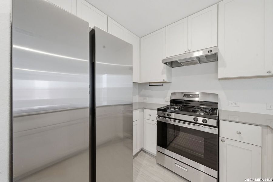 Furnished interior view inside a new home in Aston Park, San Antonio (Image 10).