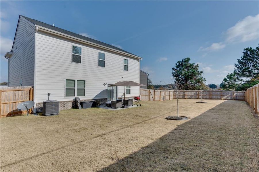 Exterior details and patio area of a home in The Reserve at Calcutta, Stockbridge (Image 3).