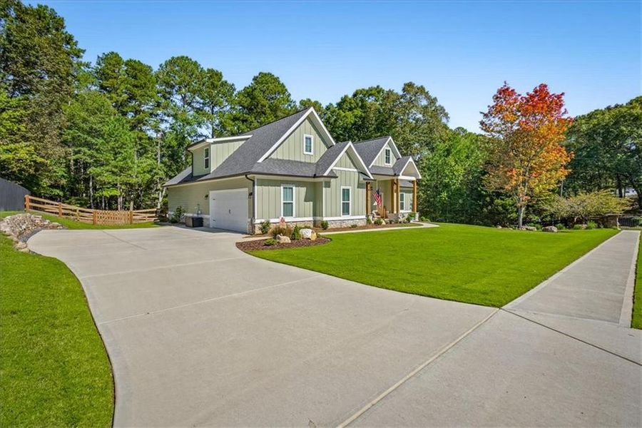 Front exterior of a new home in , Rome, GA, highlighting curb appeal (Image 2). Front exterior of a new home in , Rome, GA, highlighting curb appeal (Image 2).