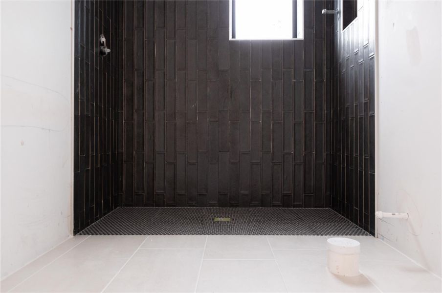 Secondary Bathroom tile on Unit B/C. Progress as of 4/15/26.