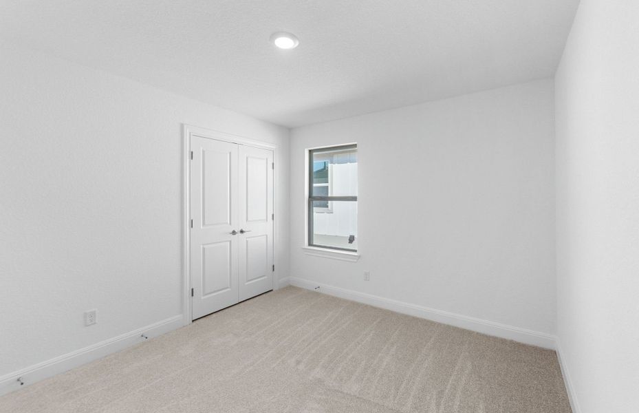 Spacious, unfurnished interior of a new home in Saddleback at Santa Rita Ranch, Liberty Hill (Image 49).