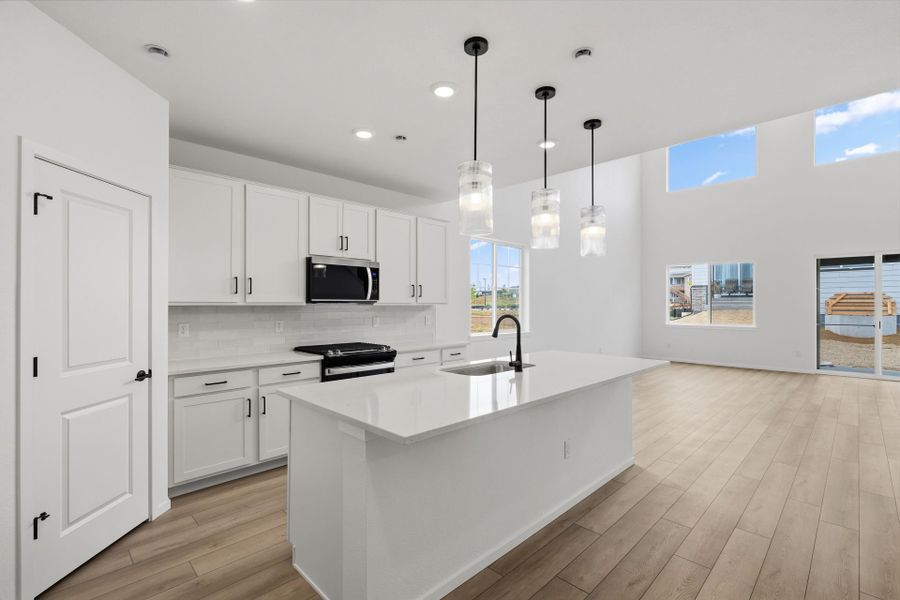 Furnished interior view inside a new home in Harvest Crossing, Aurora (Image 3).