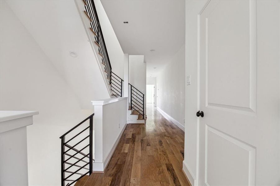 Loft area with long hallway which separates the primary from the secondary bedrooms.  Really nice to have privacy from your children and or houseguests.