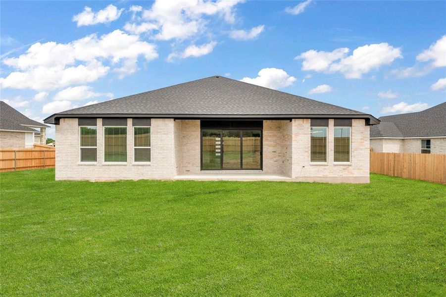 Please Note: These exterior photos are not of the actual home but are of a completed one with a similar floor plan. Finishes, features, and layouts may vary.