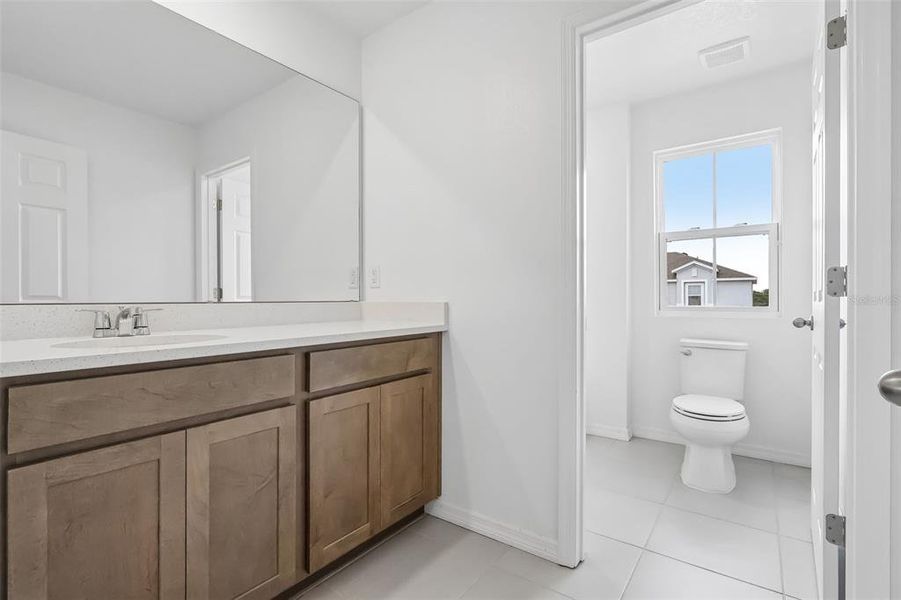 Furnished interior view inside a new home in Eagletail Landings, Howey-in-the-Hills (Image 7).