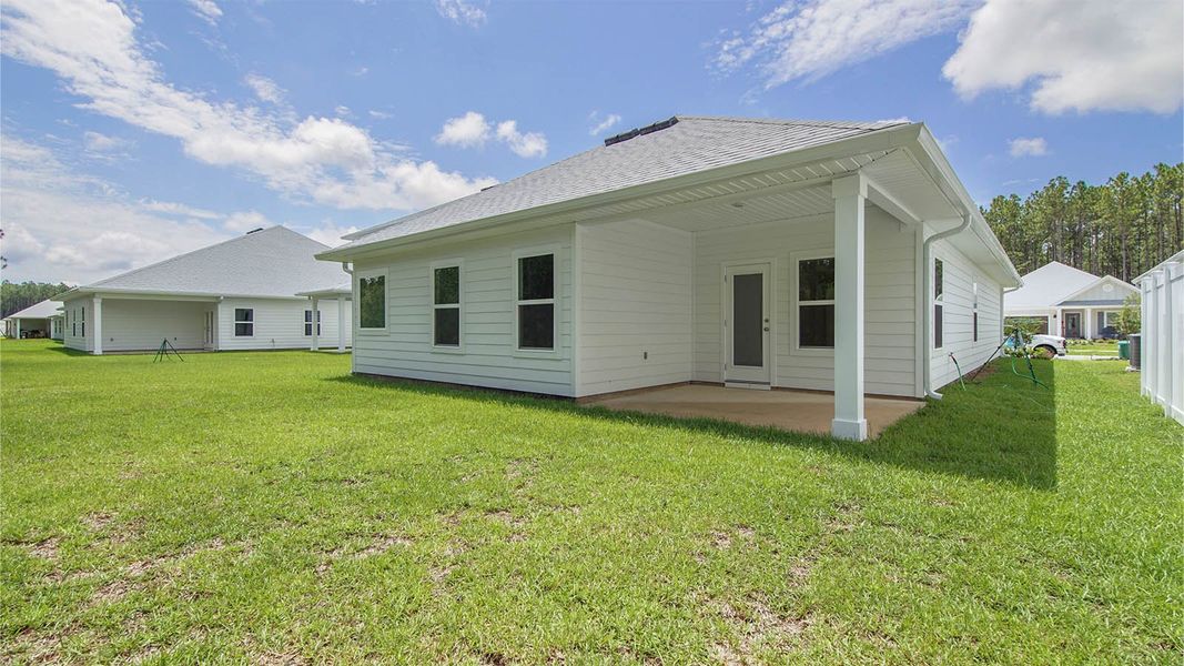 Exterior details and patio area of a home in Bayside at Ward Creek, Panama City Beach (Image 3).