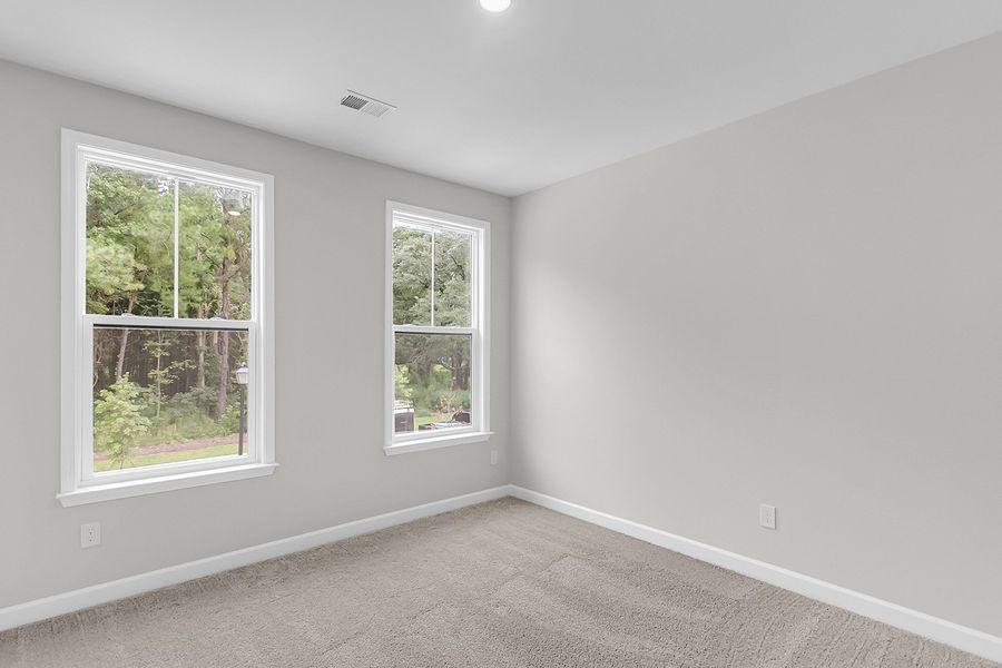 Spacious, unfurnished interior of a new home in Pineland Preserve, Summerville (Image 30).