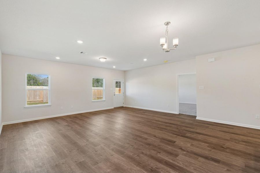 The Crawford- Family Room. Home under construction, photo used for illustrative purposes only, colors and options will vary.