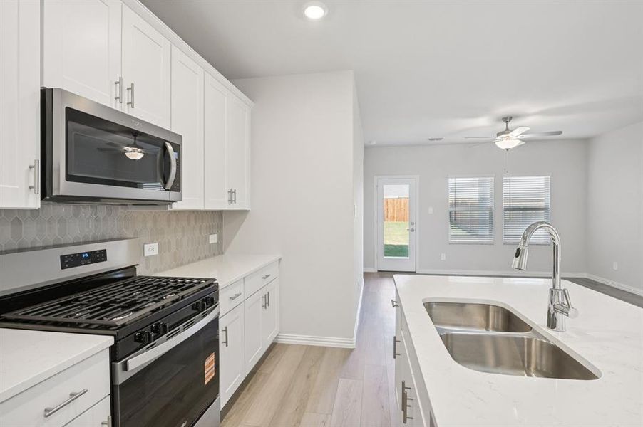 Photo is not of the actual home, but is an inspirational photo of builder’s model home and may depict options, furnishings, and/or decorator features that are not included.