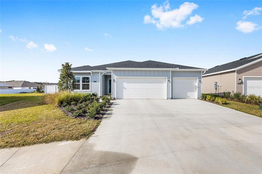 Front exterior of a new home in , Ocala, FL, highlighting curb appeal (Image 25).