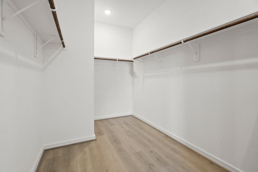 Primary Walk-In Closet Primary Walk-In Closet