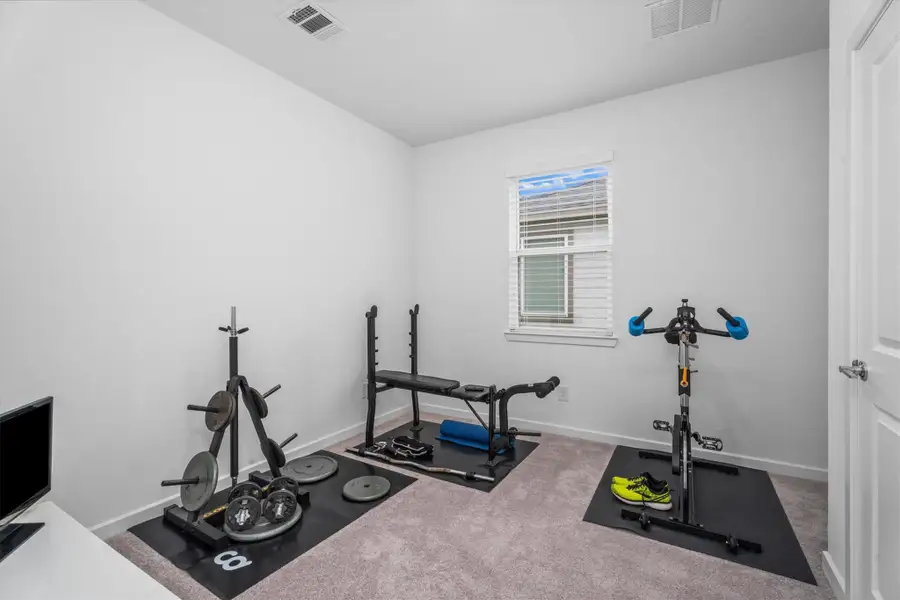 Furnished interior view inside a new home in Mason Woods, Cypress (Image 14).