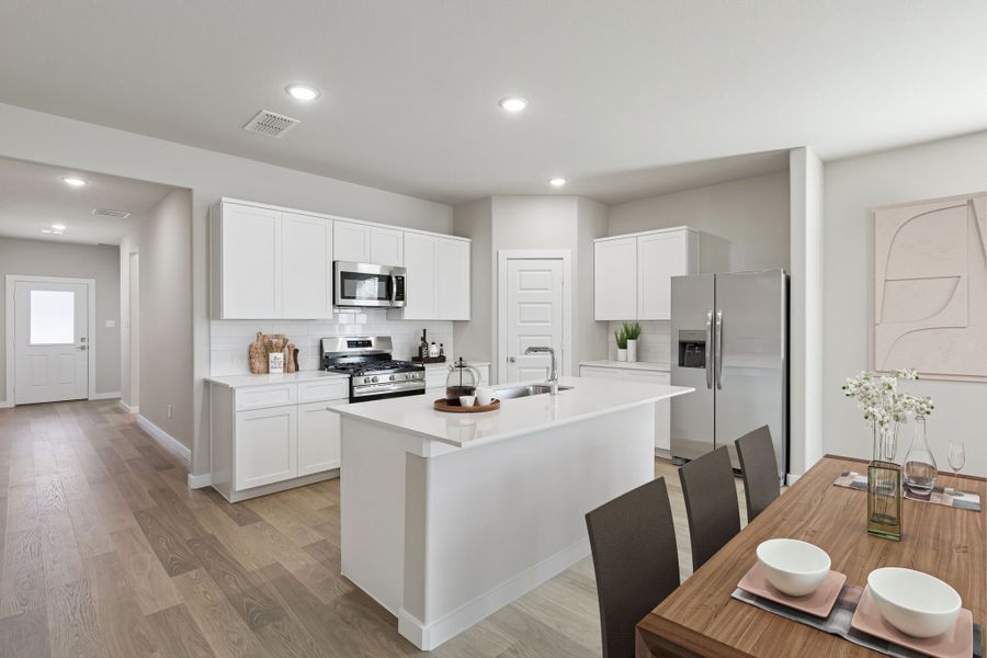 Kitchen in the Holden home plan by Trophy Signature Homes – REPRESENTATIVE PHOTO Kitchen in the Holden home plan by Trophy Signature Homes – REPRESENTATIVE PHOTO