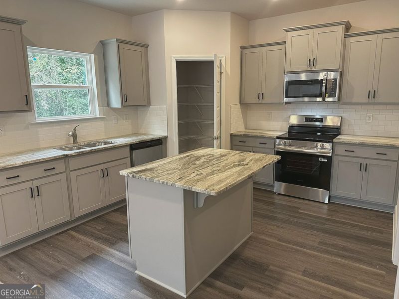 Furnished interior view inside a new home in Canterbury Villas, Carrollton (Image 7).
