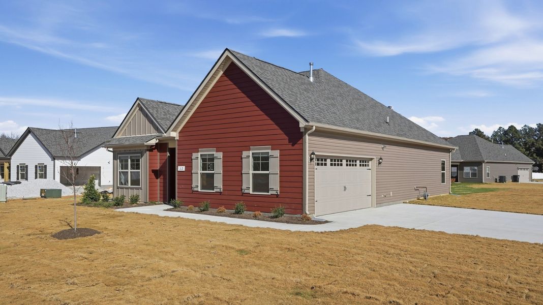 12 Brookside Court is a corner lot, house faces cul-de-sac lot with a side entry garage. the parking pad will accommodate 3 cars 12 Brookside Court is a corner lot, house faces cul-de-sac lot with a side entry garage. the parking pad will accommodate 3 cars