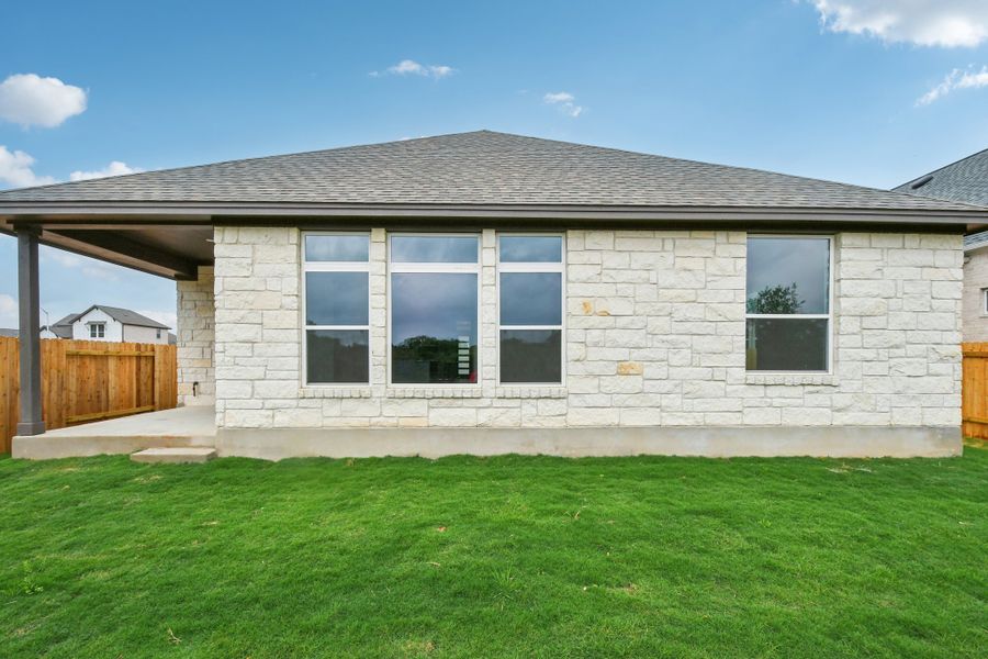 Exterior details and patio area of a home in Persimmon, Buda (Image 4). Exterior details and patio area of a home in Persimmon, Buda (Image 4).