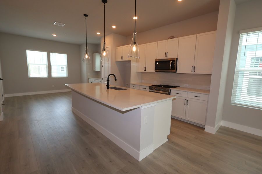 Furnished interior view inside a new home in Towns at Union, St. Petersburg (Image 6).