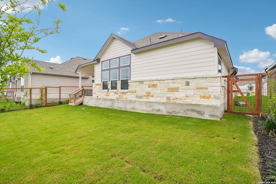 Exterior details and patio area of a home in The Crossvine, Schertz (Image 3).