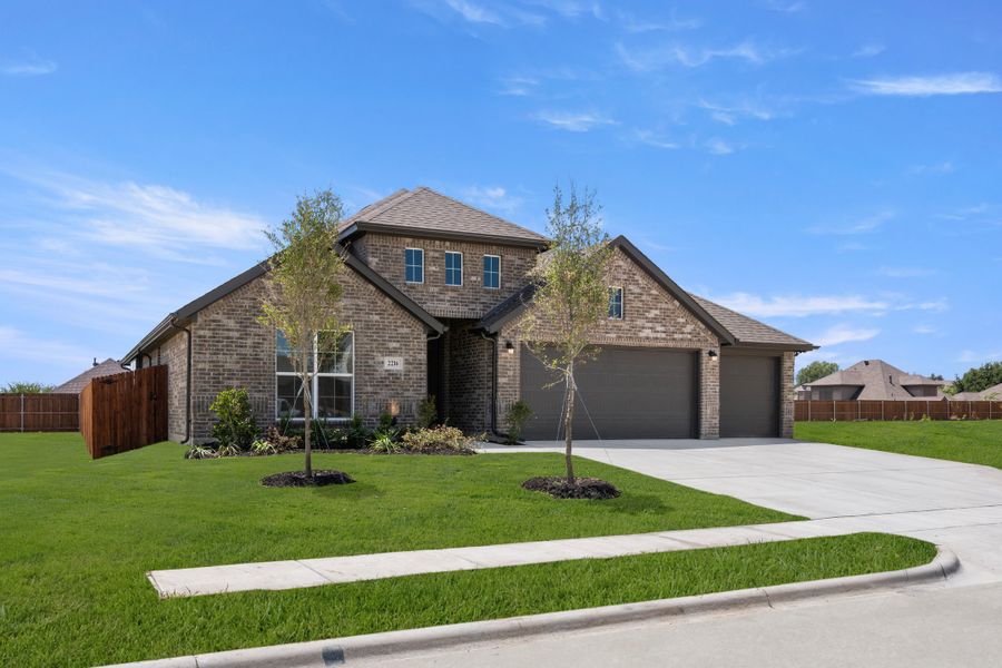 Front exterior of a new home in Waterford Park, Weatherford, TX, highlighting curb appeal (Image 2). Front exterior of a new home in Waterford Park, Weatherford, TX, highlighting curb appeal (Image 2).