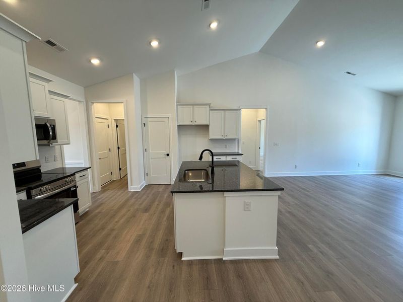 Furnished interior view inside a new home in Wood Creek Landing, Leland (Image 5).