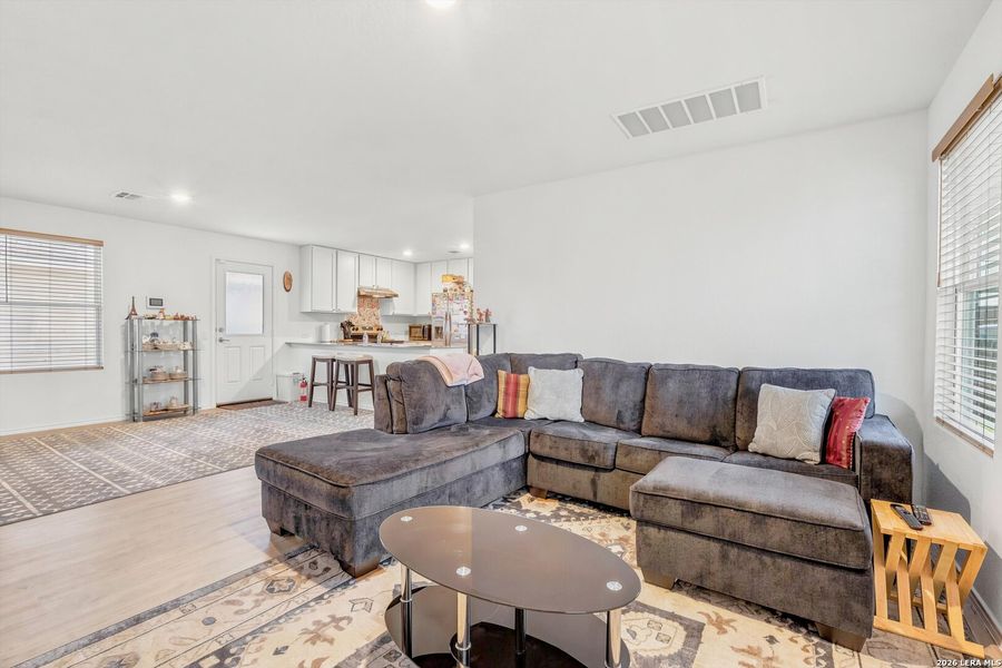 Furnished interior view inside a new home in Tarasco Gardens, San Antonio (Image 5).