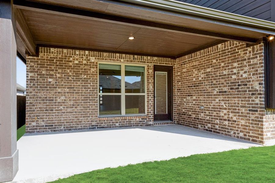 Exterior details and patio area of a home in Meadow Vista 60-65, Anna (Image 26). Exterior details and patio area of a home in Meadow Vista 60-65, Anna (Image 26).