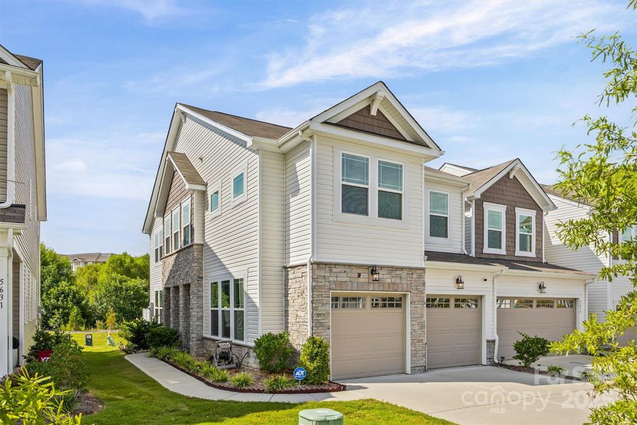Front exterior of a new home in , Indian Land, SC, highlighting curb appeal (Image 19).