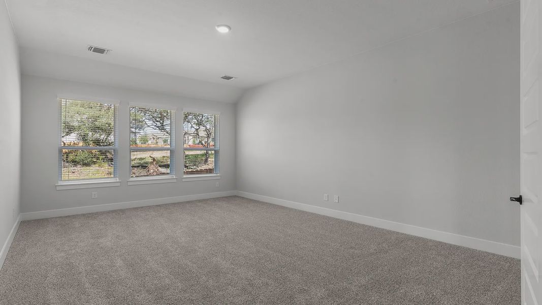 Representative unfurnished interior of a home built from the Mariah by Chesmar Homes in Newhaven, Manor (Image 12).