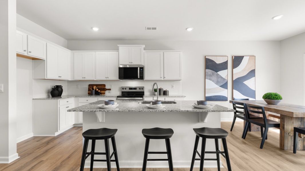 Representative furnished interior of a home built from the Salisbury by D.R. Horton in Carlton, Douglasville (Image 7).