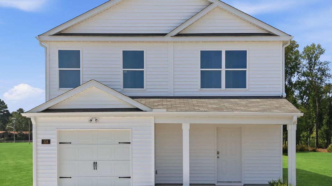 Front exterior of a new home in Hobbs Farm, Ayden, NC, highlighting curb appeal (Image 2). Front exterior of a new home in Hobbs Farm, Ayden, NC, highlighting curb appeal (Image 2).