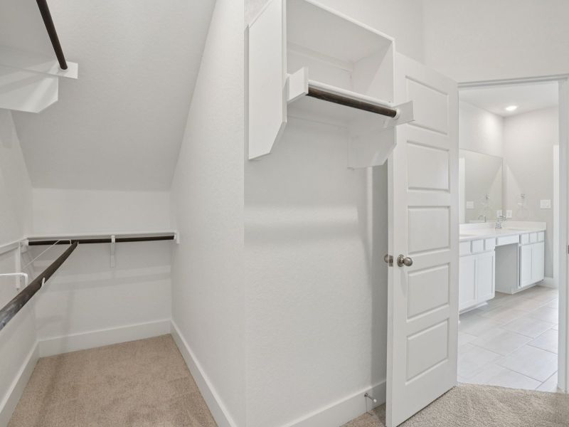 Primary Closet in the San Jacinto floorplan at a Meritage Homes community. Primary Closet in the San Jacinto floorplan at a Meritage Homes community.