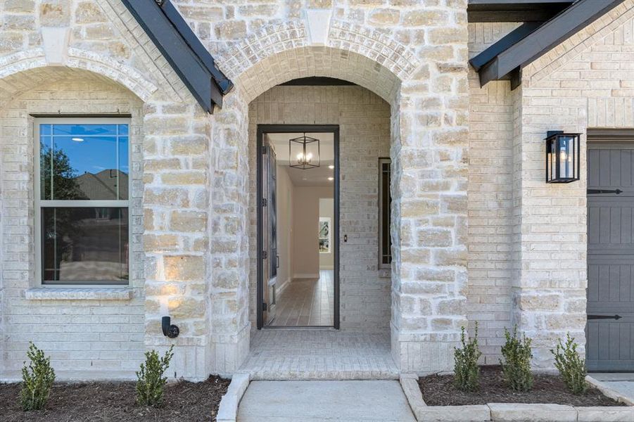 Exterior details and patio area of a home in Abe's Landing, Granbury (Image 3).