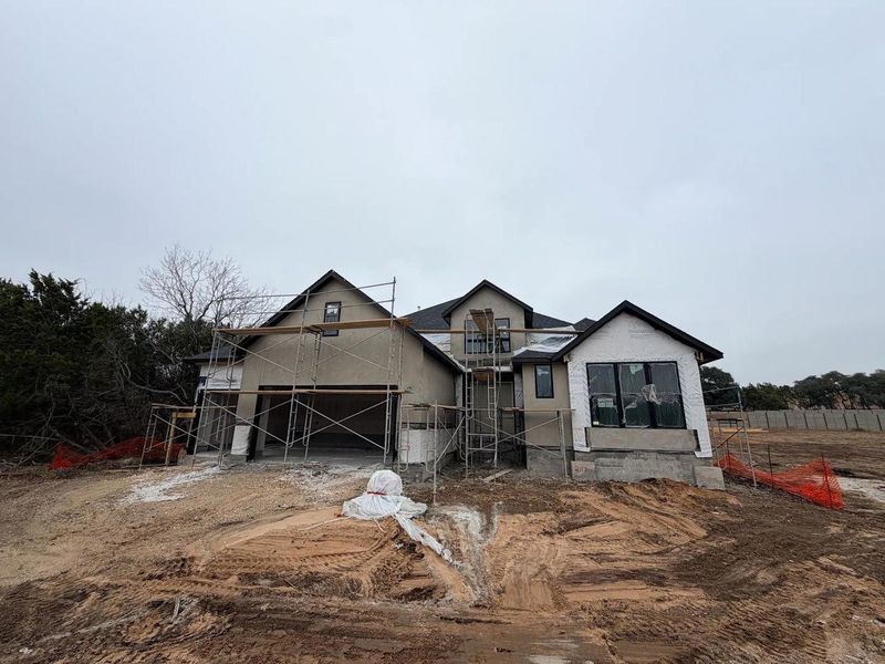 In-progress construction of a new home in Wolf Ranch West Bend - 70', Georgetown, TX (Image 4).