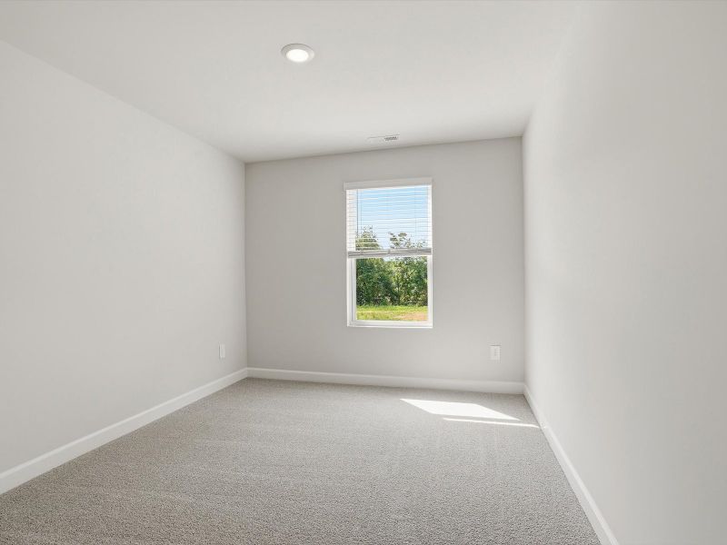 Spacious, unfurnished interior of a new home in Crossing at Abner Creek Townes, Greer (Image 14).