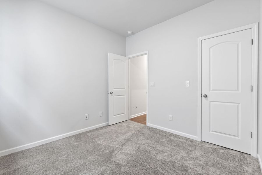 A room with white doors.