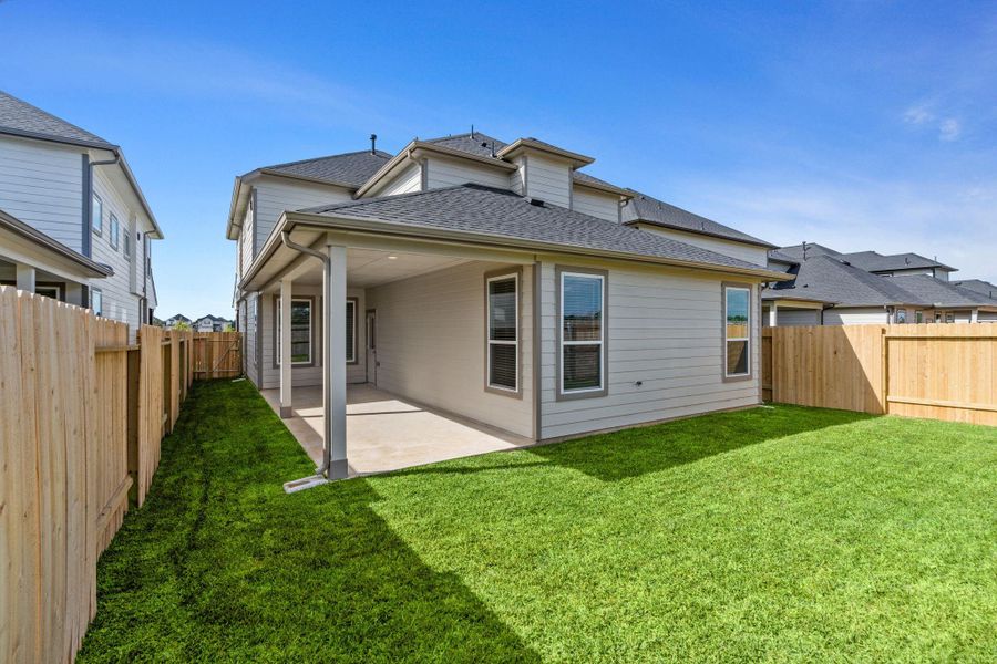 Exterior details and patio area of a home in Grand Oaks Village, Houston (Image 14). Exterior details and patio area of a home in Grand Oaks Village, Houston (Image 14).